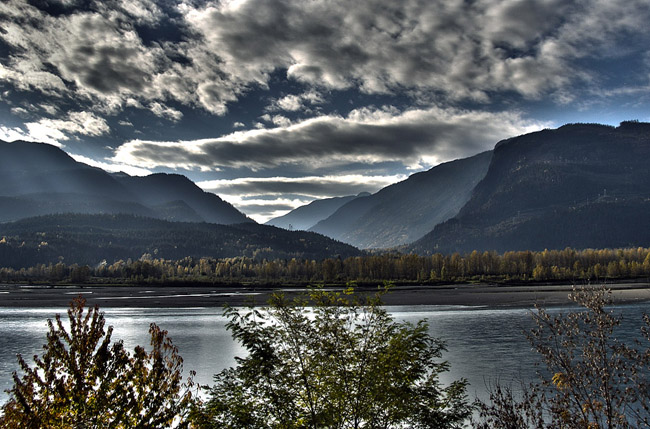 HDR photo of mountains across Lake Revelstoke