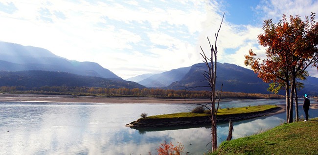 Panorama of a girl and Lake Revelstoke