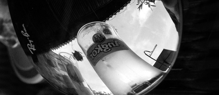 Angkor beer reflected in V's Ray Bans