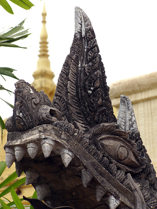 Dragon sculpture in the Golden Stupa courtyard